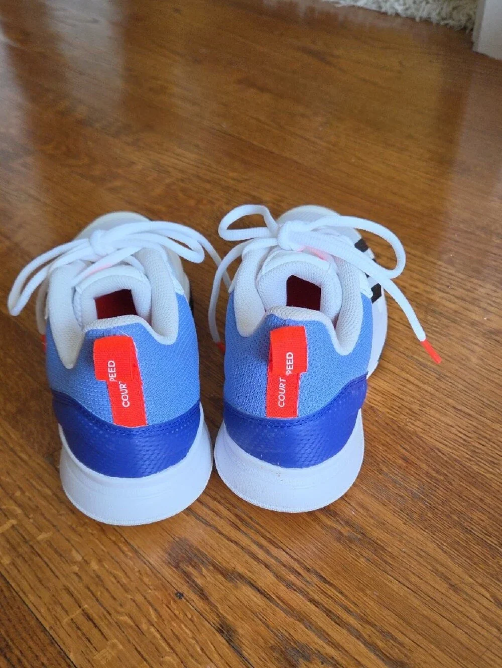 Adidas Kids White Sneakers with Blue and Black Accents